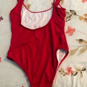 Red high leg bathing suit